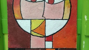Kopia obrazu Poul'a Klee pt. Senecio wykonana przez uczniów 4b